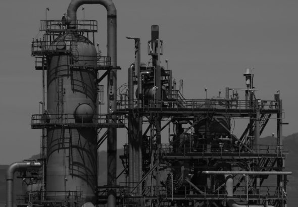 a black and white photo of an industrial plant