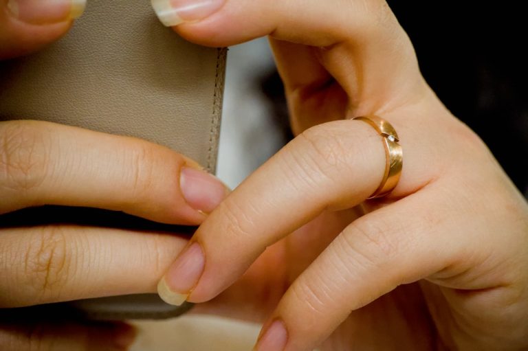 Close-up of hands holding a smartphone